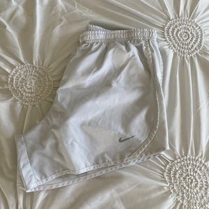 white nike shorts
